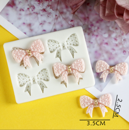 4 Cavity studded Bow candy silicone mould
